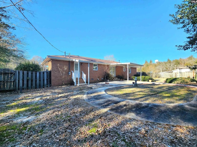 view of front of property with a patio