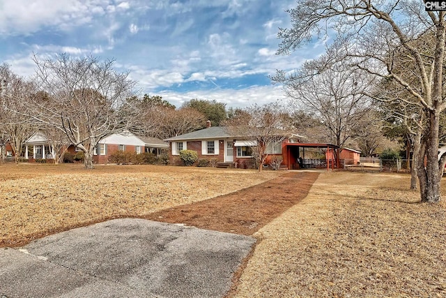 view of front of house featuring a carport