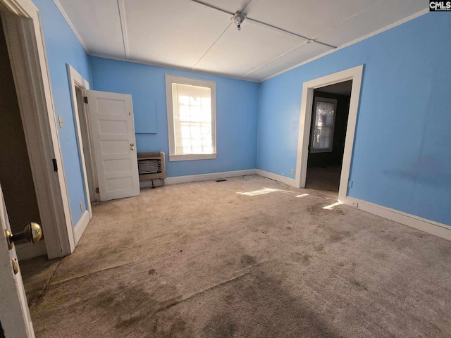 6500 White St, Kershaw, SC 29067 - carpeted empty room featuring heating unit and crown molding