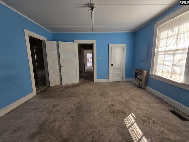 6500 White St, Kershaw, SC 29067 - unfurnished bedroom featuring crown molding, carpet flooring, and heating unit
