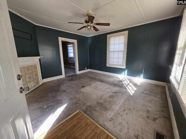 6500 White St, Kershaw, SC 29067 - carpeted spare room featuring ceiling fan and ornamental molding