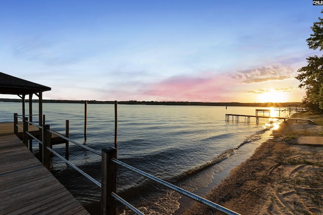 dock area featuring a water view