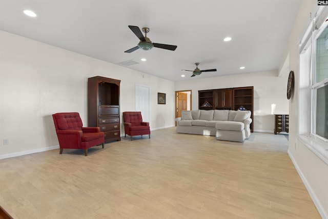 living room with light hardwood / wood-style floors