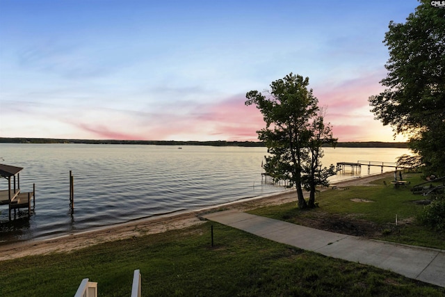 dock area featuring a water view