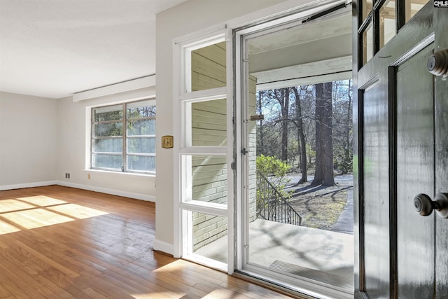 doorway featuring hardwood / wood-style flooring