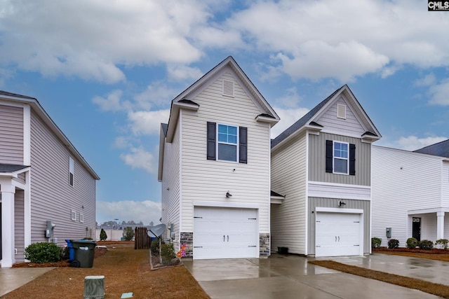 view of front of property with a garage