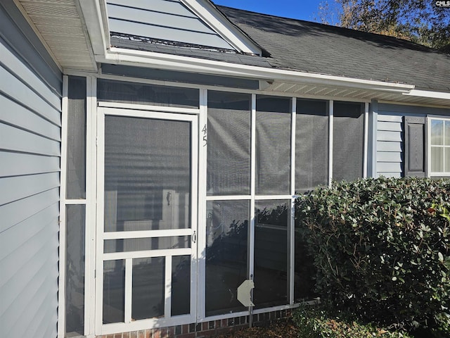 view of home's exterior featuring a sunroom