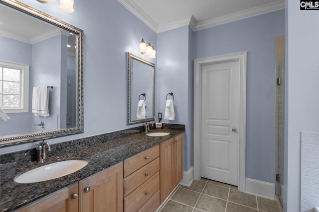 bathroom with vanity, tile patterned floors, and ornamental molding