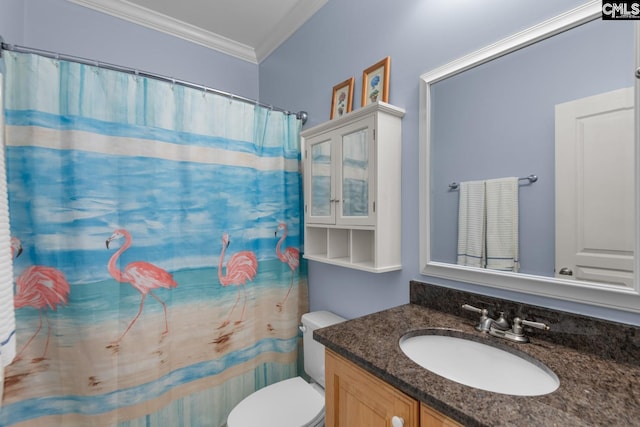 bathroom featuring crown molding, vanity, toilet, and walk in shower