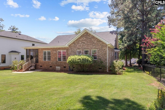 view of front of home with a front lawn