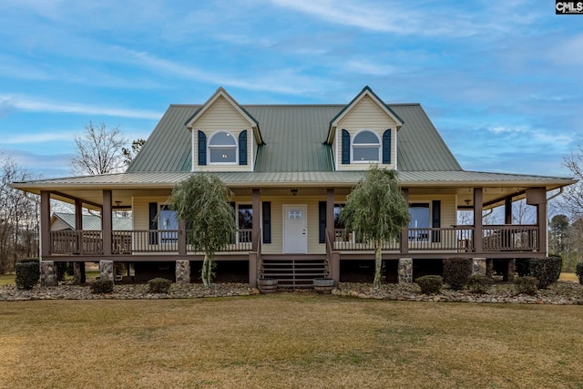 country-style home with a front lawn and a porch