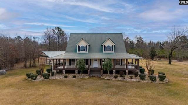 farmhouse with a porch and a front lawn