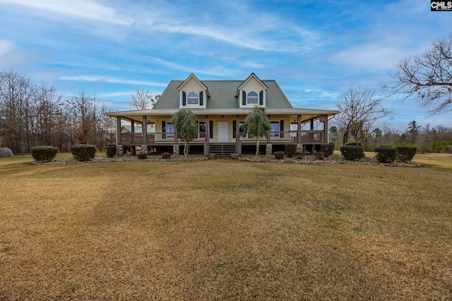 farmhouse with a porch and a front yard