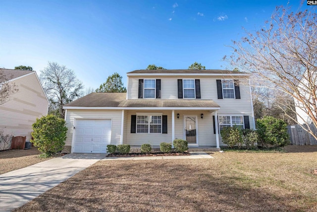 view of front of property featuring a garage and a front yard