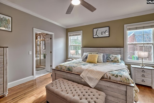 bedroom featuring ceiling fan, ornamental molding, connected bathroom, and light wood-type flooring