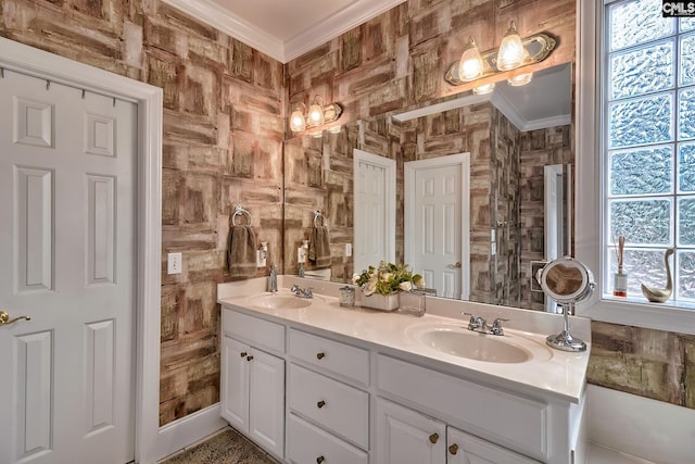 bathroom with crown molding and vanity