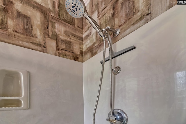 details featuring a tile shower