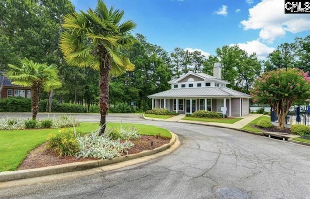 exterior space featuring a front yard