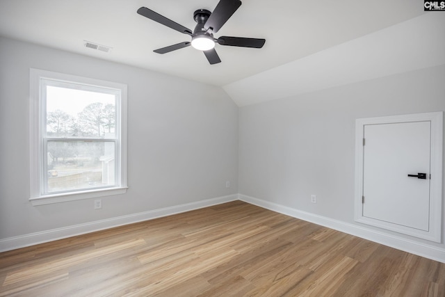 bonus room featuring ceiling fan, lofted ceiling, and light wood-type flooring