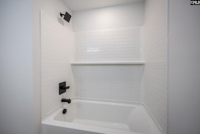 bathroom featuring tiled shower / bath combo