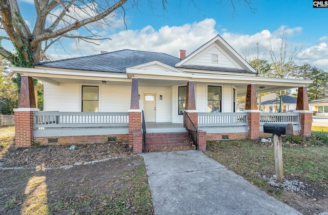 bungalow-style home with covered porch