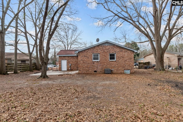 view of home's exterior with central air condition unit