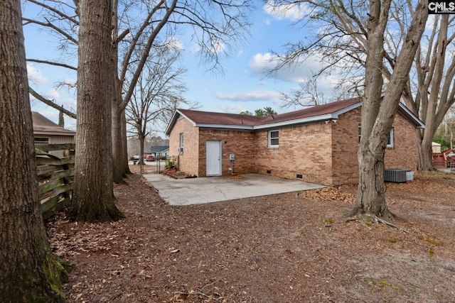 back of property featuring central AC and a patio