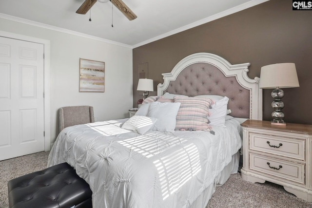 bedroom featuring ceiling fan, ornamental molding, and light carpet