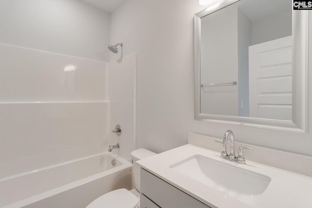 full bath featuring bathtub / shower combination, vanity, and toilet