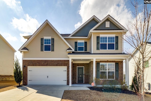 craftsman-style house featuring a garage and covered porch