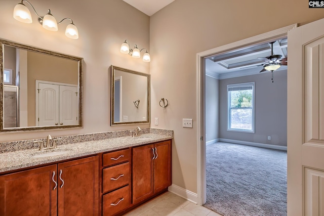 bathroom featuring crown molding, ceiling fan, vanity, and tile patterned flooring