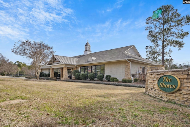 exterior space with a front lawn