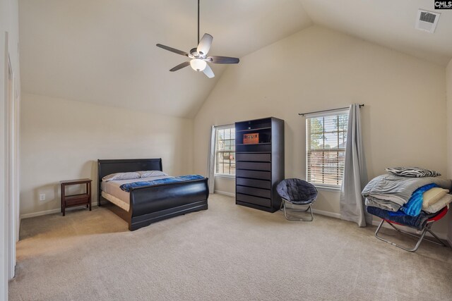 bedroom featuring high vaulted ceiling, light colored carpet, and ceiling fan