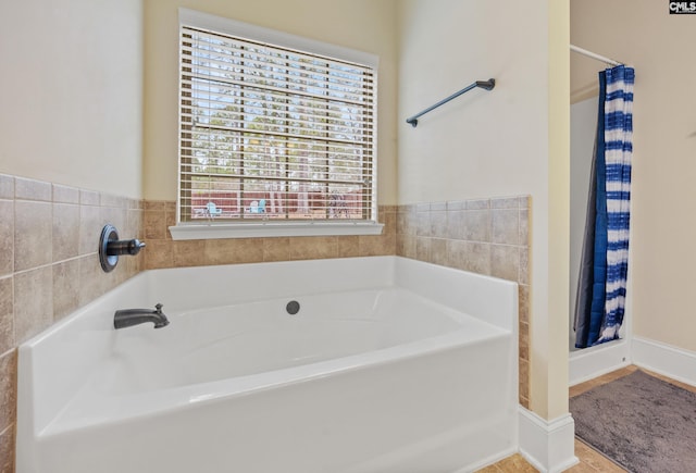 bathroom with independent shower and bath