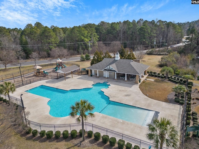 view of swimming pool with a patio area