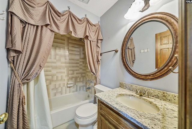 full bathroom featuring shower / bathtub combination with curtain, vanity, a textured ceiling, and toilet