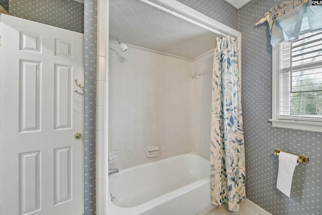 bathroom with shower / bath combination with curtain