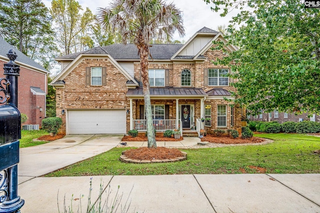 craftsman house with a garage, central AC, a front lawn, and covered porch