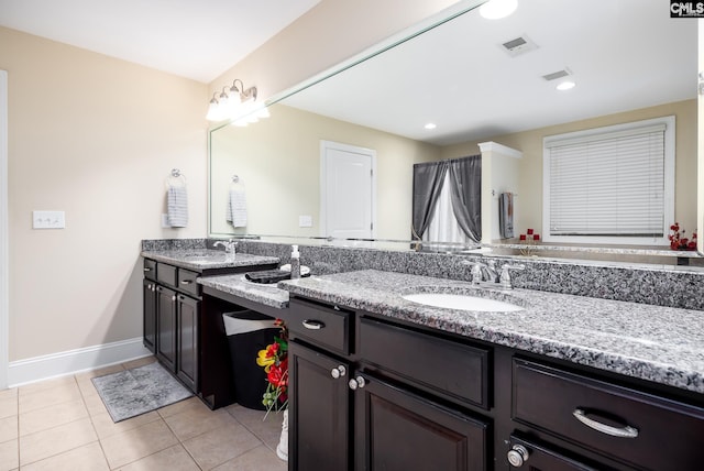 bathroom featuring vanity and tile patterned flooring