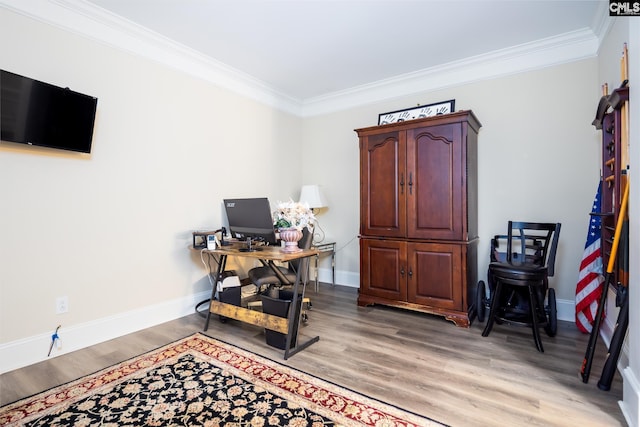 home office with ornamental molding and wood-type flooring