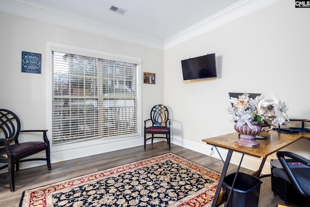 office space featuring crown molding and hardwood / wood-style floors