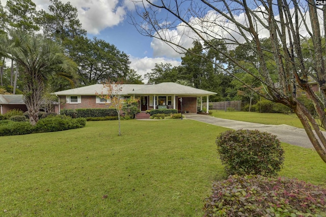 single story home featuring a front lawn and a carport