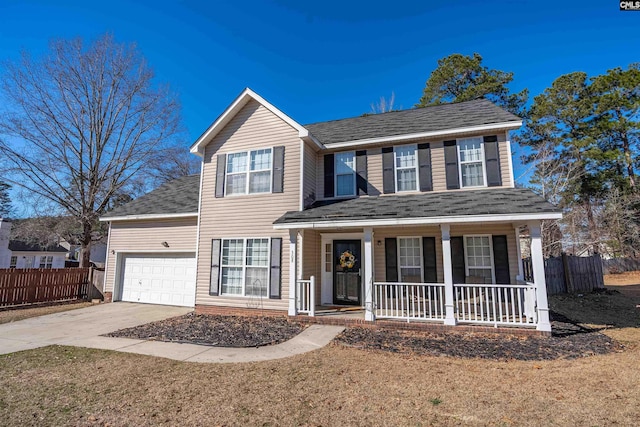 view of front of home with a garage, covered porch, and a front lawn