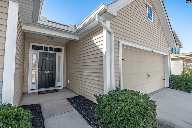 entrance to property with a garage