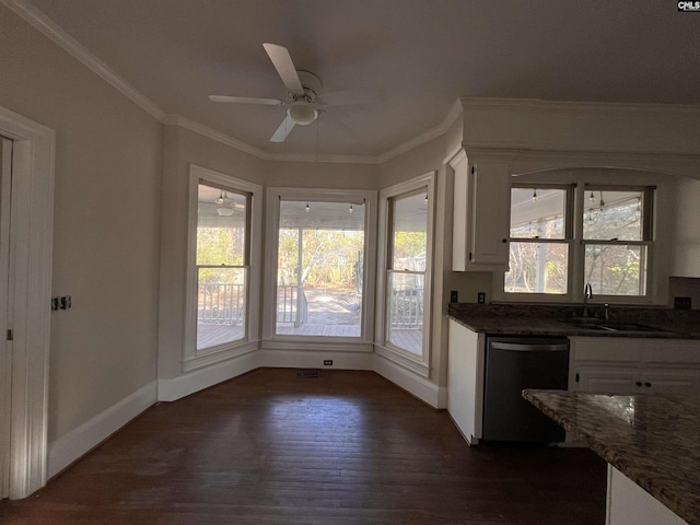 interior space with sink, ornamental molding, dark hardwood / wood-style floors, and ceiling fan