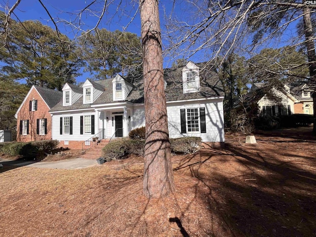 view of cape cod-style house