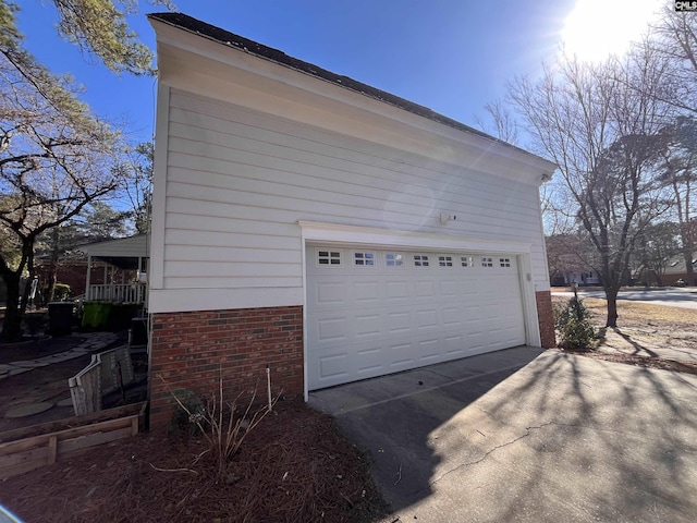 view of side of property featuring a garage