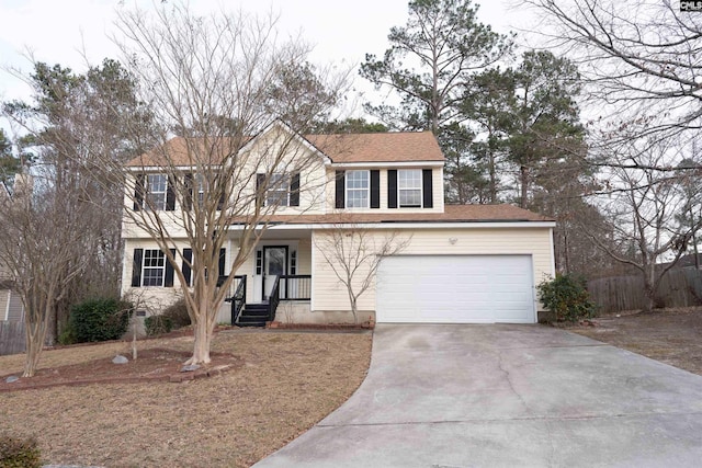 view of front of property featuring a garage