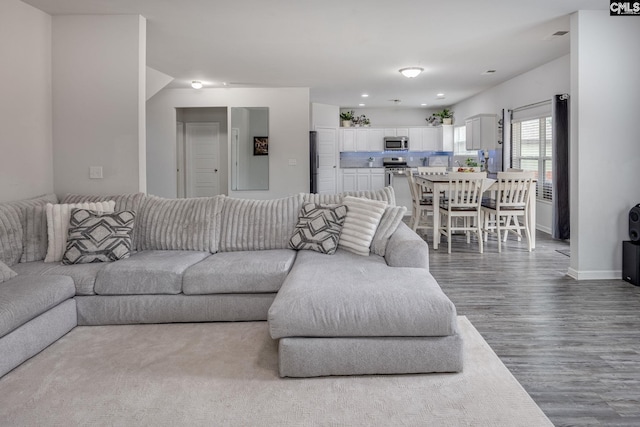 living room with hardwood / wood-style flooring