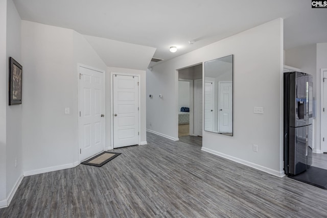 empty room with wood-type flooring